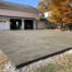 Fortville, Indiana gray broom finish concrete driveway and parking apron.