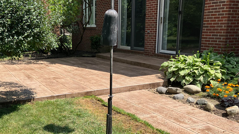 Stained and stamped concrete patio, sidewalk and steps in Carmel, Indiana. 