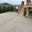 New exposed aggregate concrete backyard patio in Westfield, Indiana.