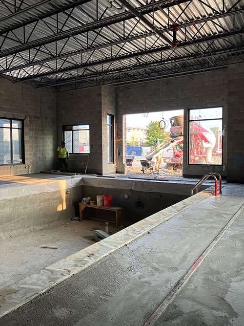 Concrete pool, pool deck slab & trash enclosure footings for a new Residence Inn in Plainfield, Indiana.