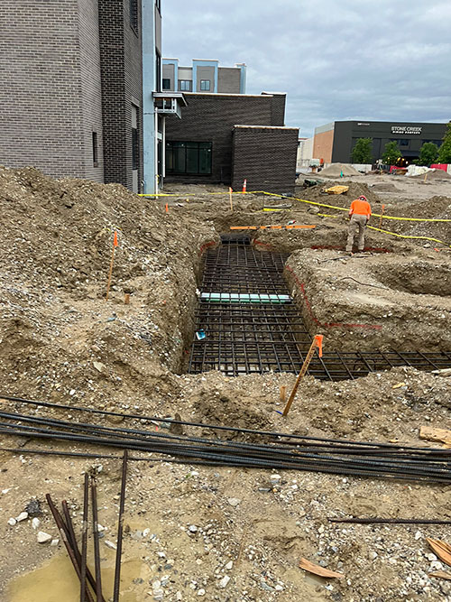 Concrete pool, pool deck slab & trash enclosure footings for a new Residence Inn in Plainfield, Indiana.